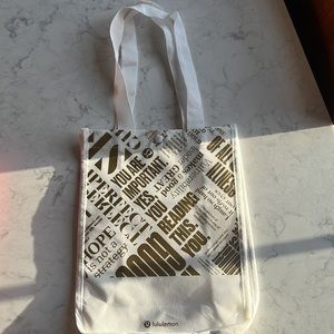 Lululemon white and gold reusable small bag